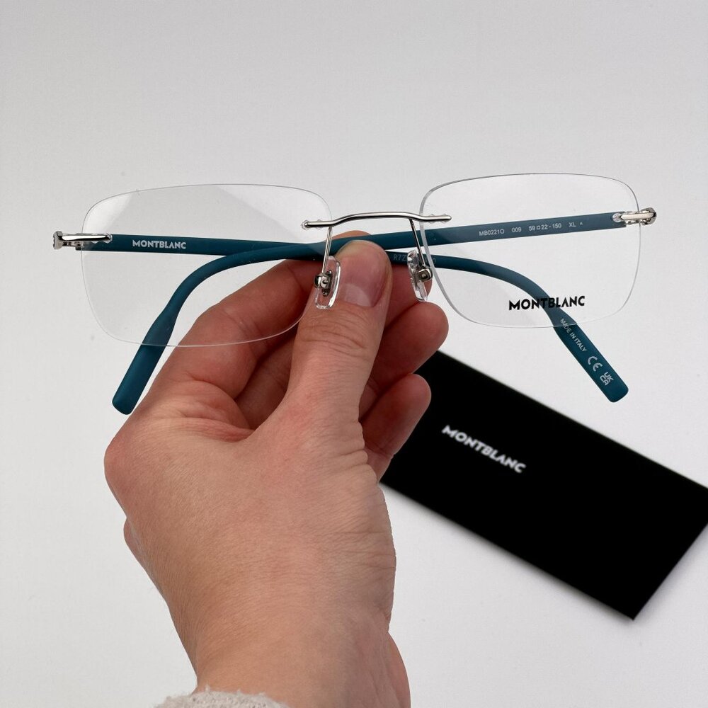 Montblanc Men Eyeglasses Silver Blue Rectangle Rimless Frame | Model MB0221O 009